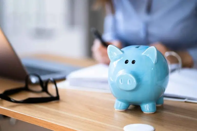 Blue Piggy Bank sitting on desk